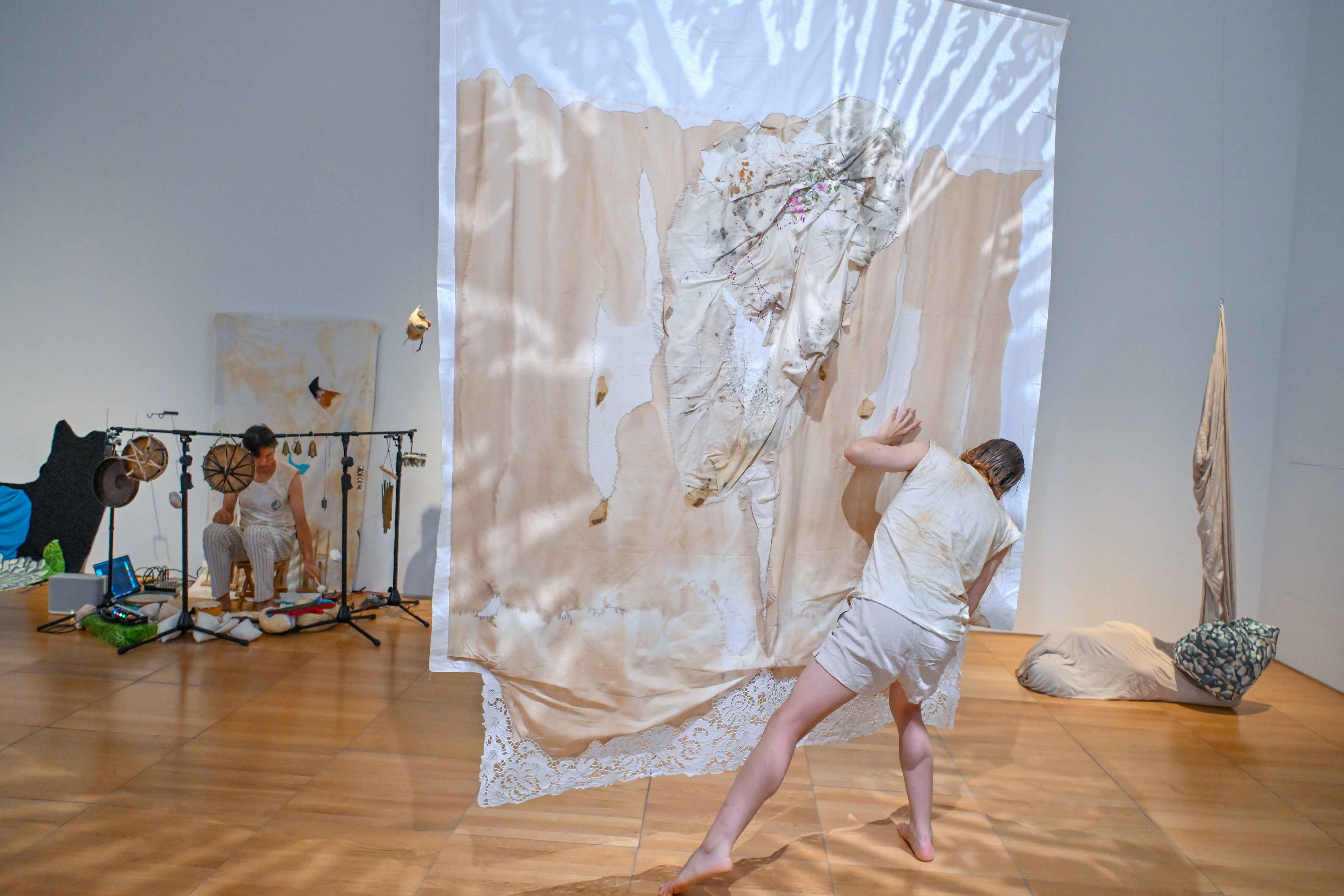 A still from the performance of Entrusted Ground