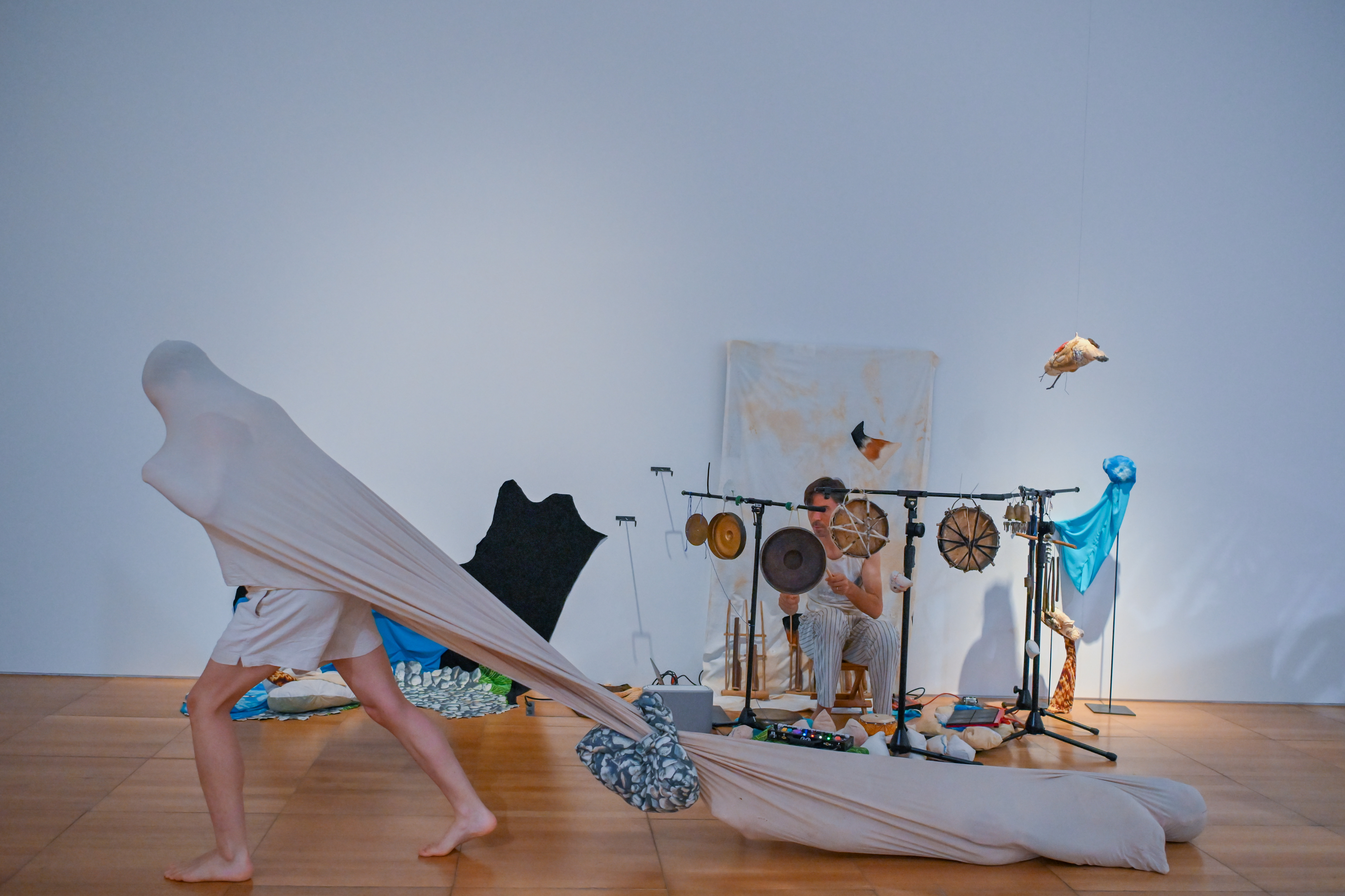 A still from the performance of Entrusted Ground