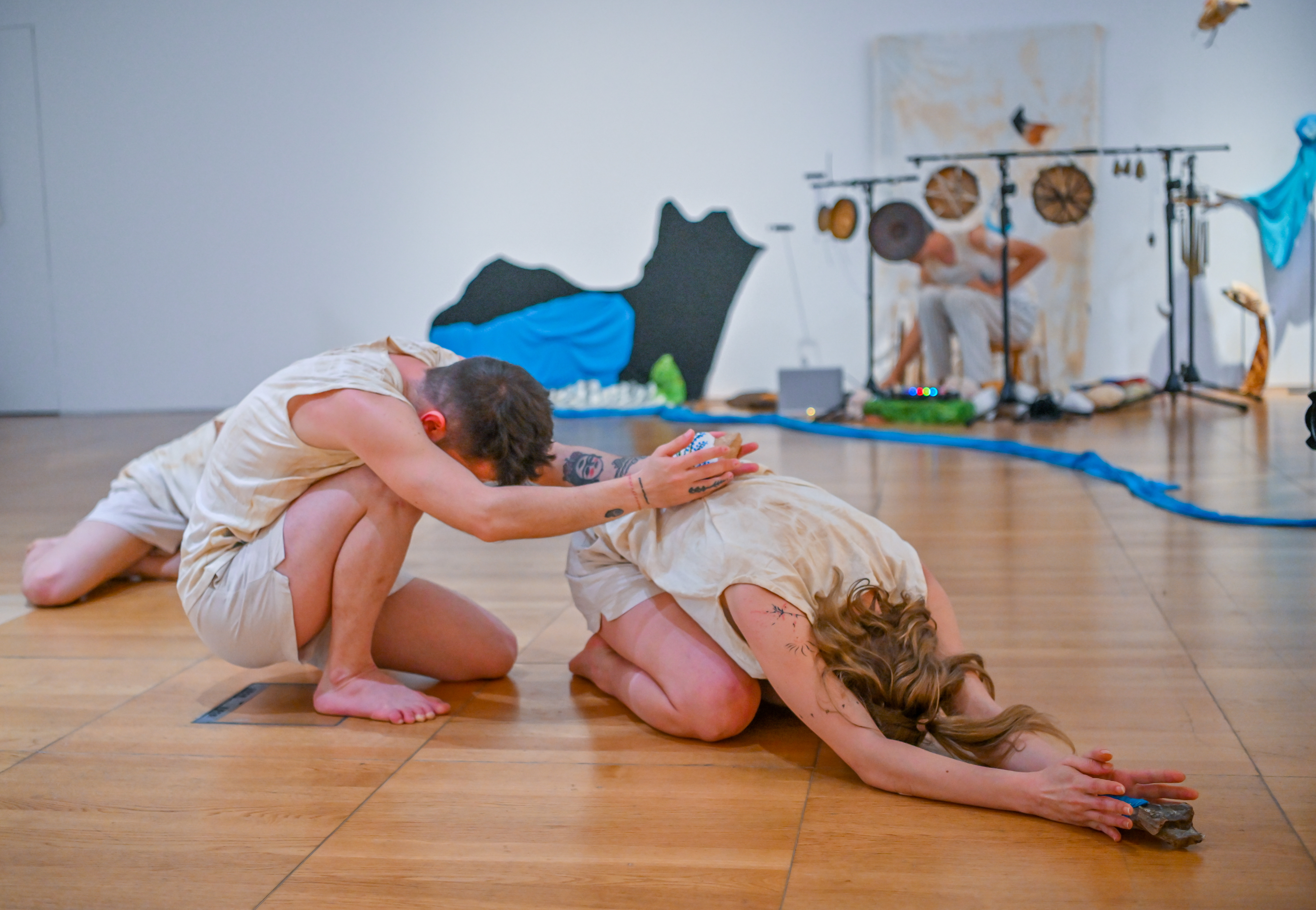 A still from the performance of Entrusted Ground